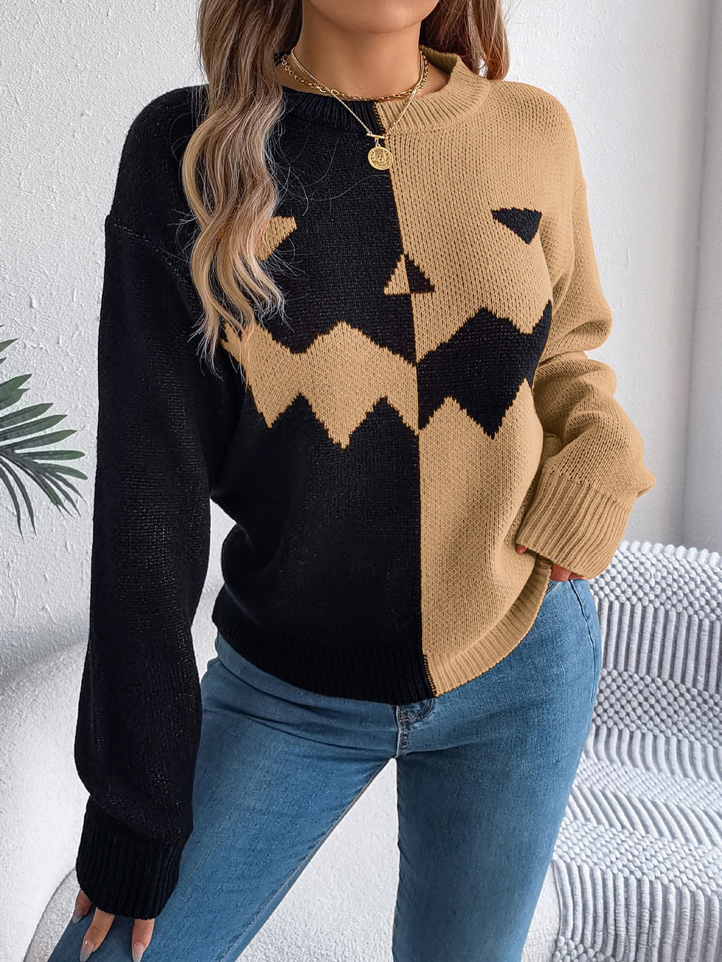 Women's graphic knit sweater with crew neckline and ribbed trims