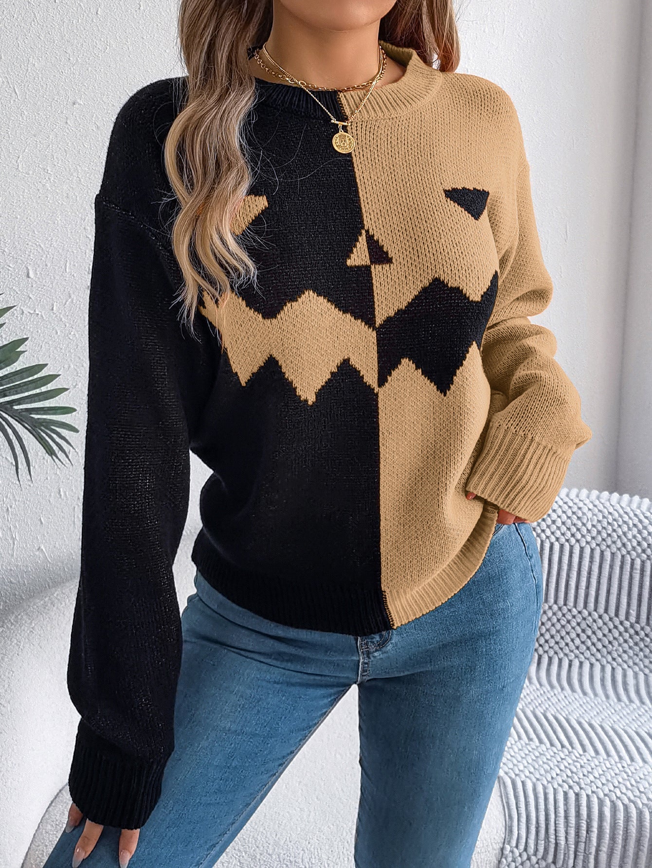 Women's graphic knit sweater with crew neckline and ribbed trims