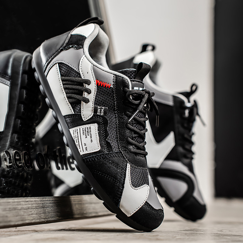 Colourblock utility trainers with layered panels and lace-up fronts