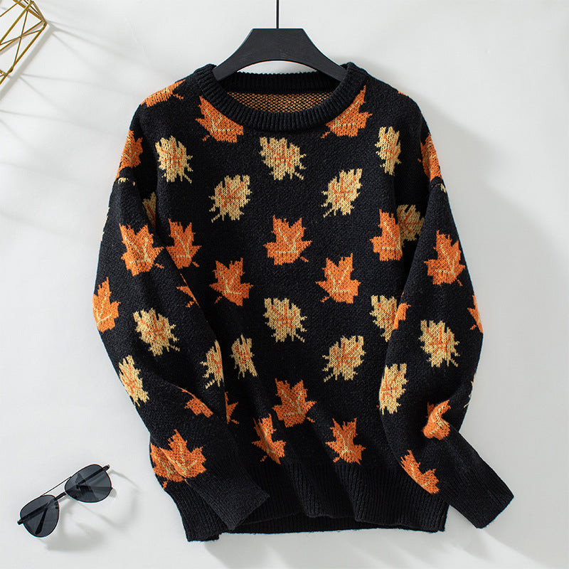 Women's crew neck sweater with repeated maple leaf pattern and long sleeves