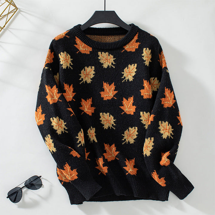 Women's crew neck sweater with repeated maple leaf pattern and long sleeves