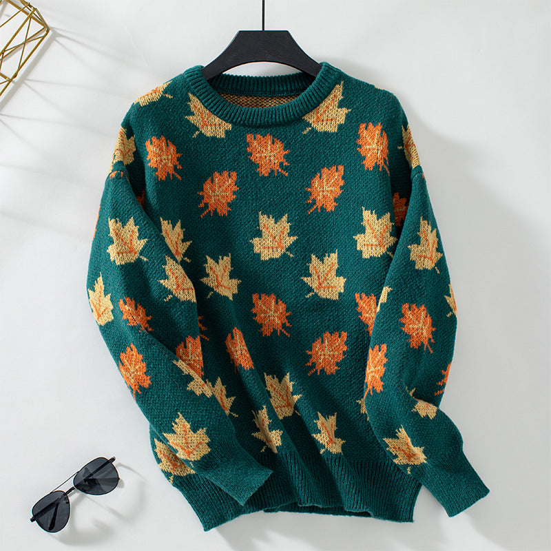 Women's crew neck sweater with repeated maple leaf pattern and long sleeves
