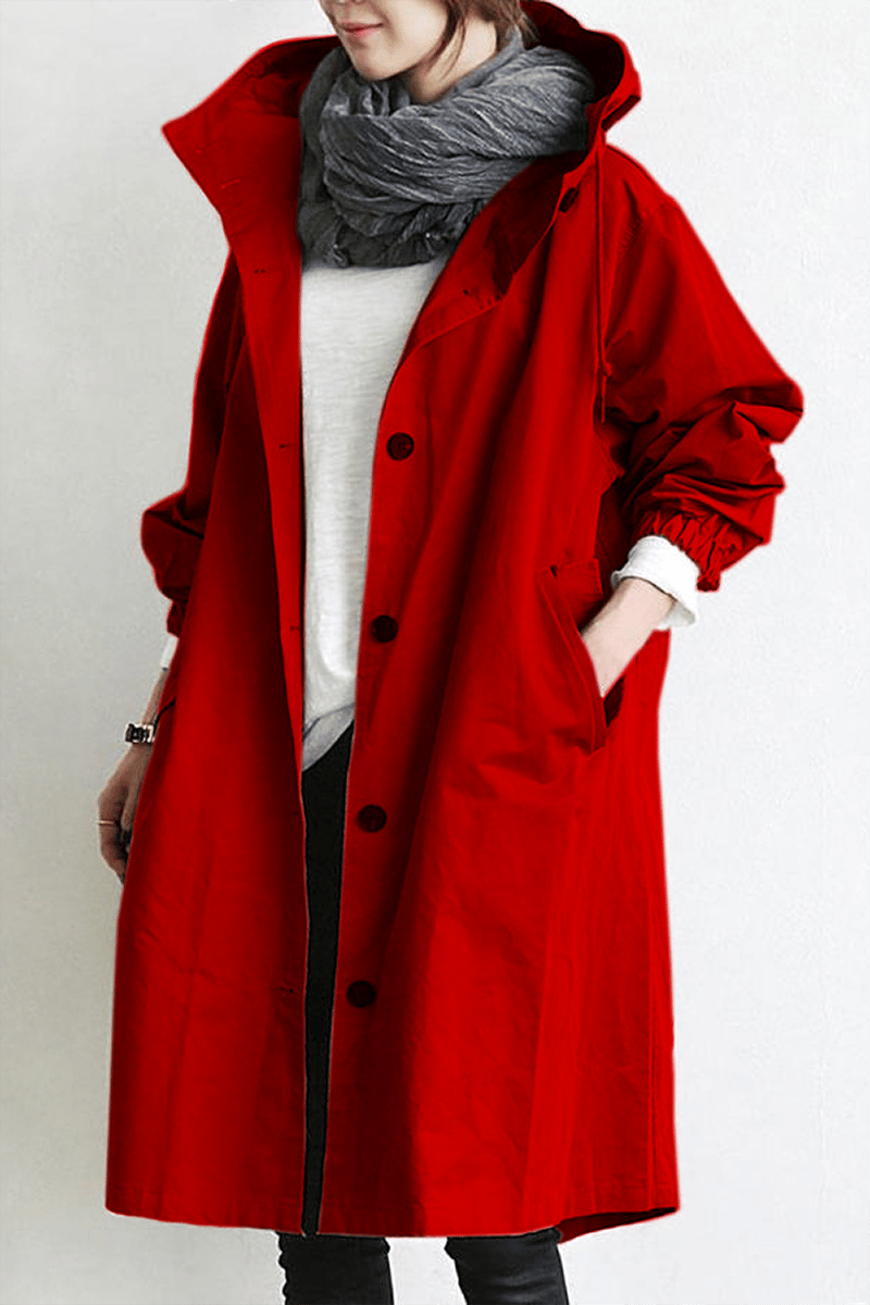 Women's long hooded button front trench coat with elasticated cuffs and front pockets