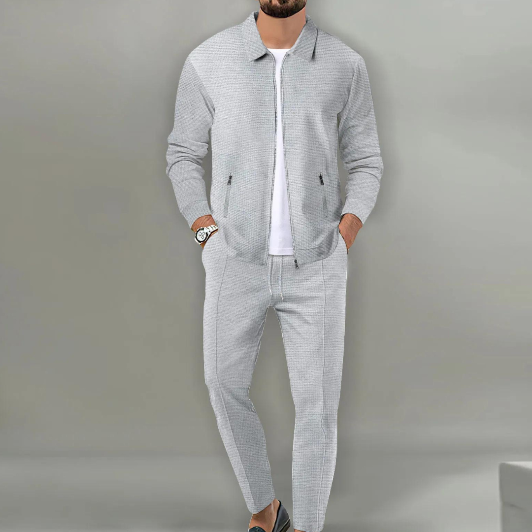 Men's two-piece textured tracksuit set with zip jacket and tapered trousers