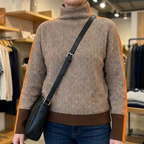 Women's geometric zigzag high neck pullover with long sleeves and contrast trims