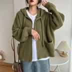 Women's hooded rib knit zip cardigan with long sleeves and front pockets