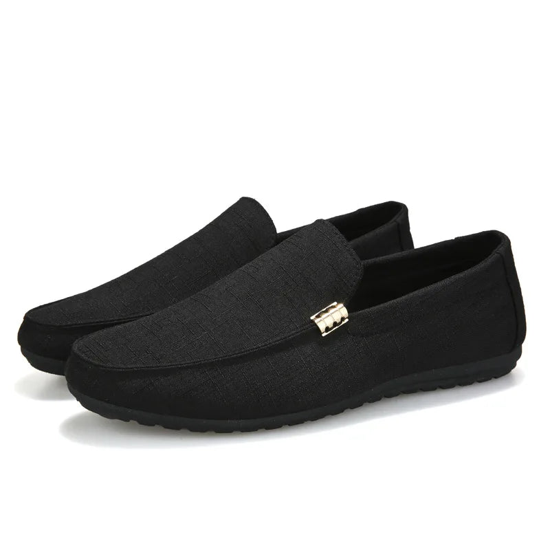 Men's slip-on loafers with gold-tone metal detail and flat sole