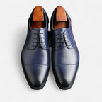 Men's lace-up Oxford shoes with polished finish and cap-toe detailing
