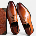 Men's lace-up Oxford shoes with polished finish and cap-toe detailing