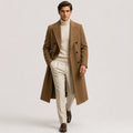 Men's long double-breasted trench coat with notched lapels and side pockets
