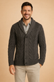Men's dark grey chunky cable knit cardigan with a shawl collar and button front