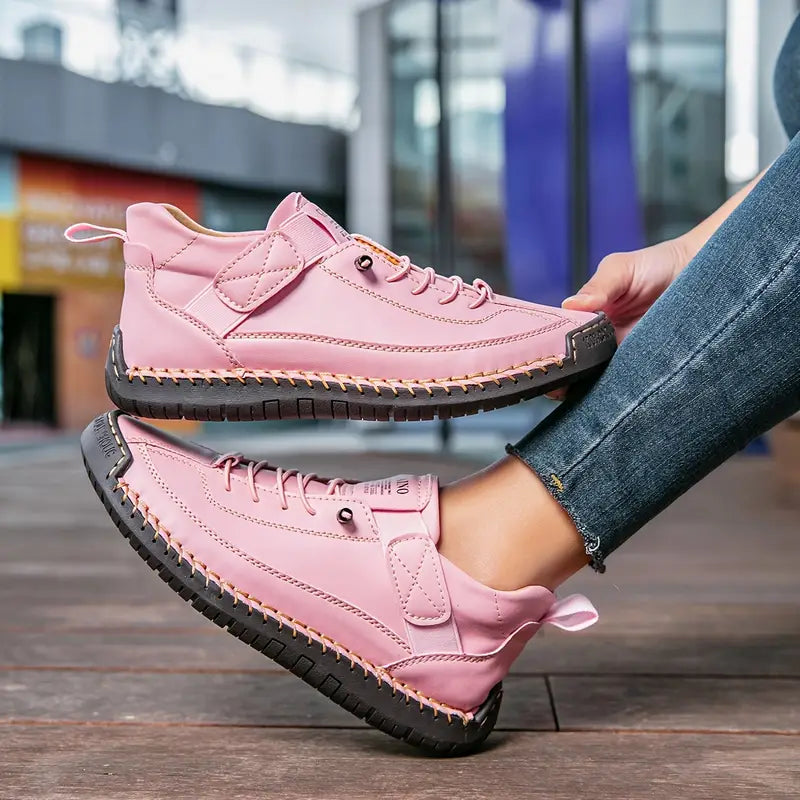 Women's lace-up casual sneakers with ankle strap and stitched panels