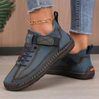 Women's lace-up casual sneakers with ankle strap and stitched panels