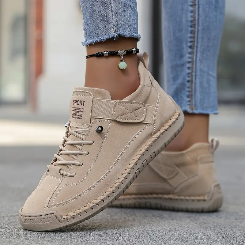 Women's lace-up casual sneakers with ankle strap and stitched panels