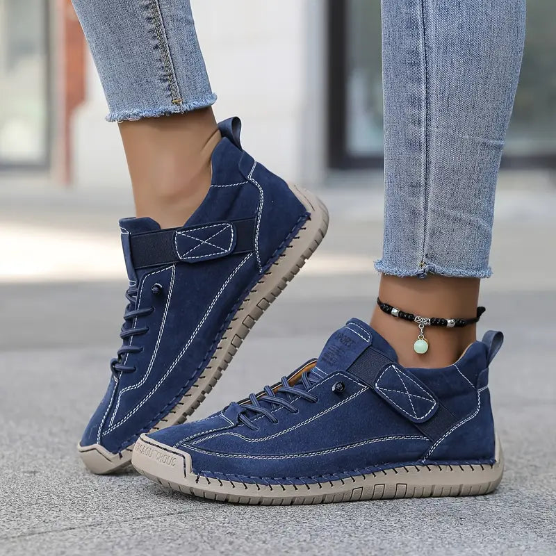 Women's lace-up casual sneakers with ankle strap and stitched panels