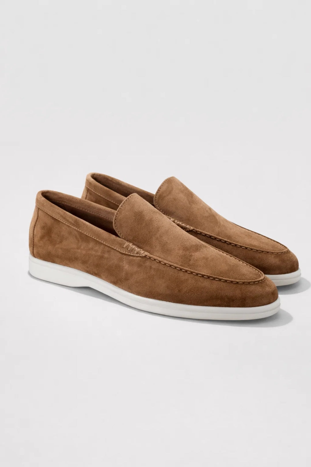 Men's slip-on moc toe loafers with white soles
