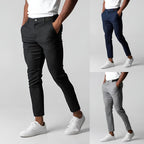 Men's slim tapered chinos trousers shown in black and navy with side pockets