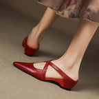 Women's pointed mule shoes with crossed straps and low wedge heels