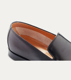 Men's black glossy apron front loafer with pointed toe