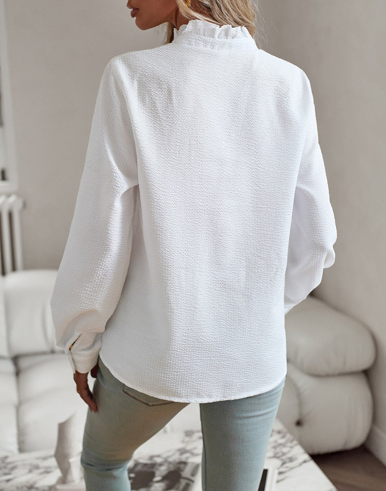 Women's long-sleeve blouse with ruffle neckline and front panel