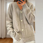 Women's cable knit cardigan with V-neck and button front