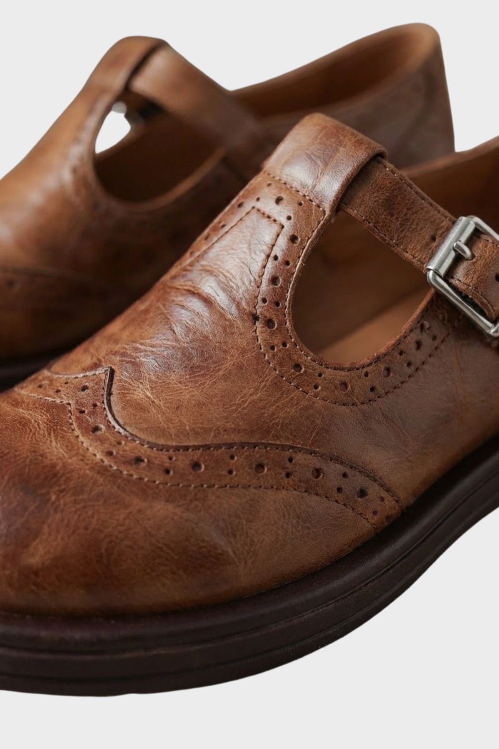 Women's Oxford Mary Jane flats with brogue detailing and buckle straps