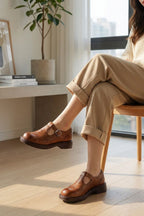 Women's Oxford Mary Jane flats with brogue detailing and buckle straps