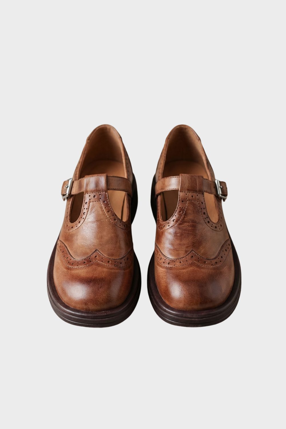 Women's Oxford Mary Jane flats with brogue detailing and buckle straps