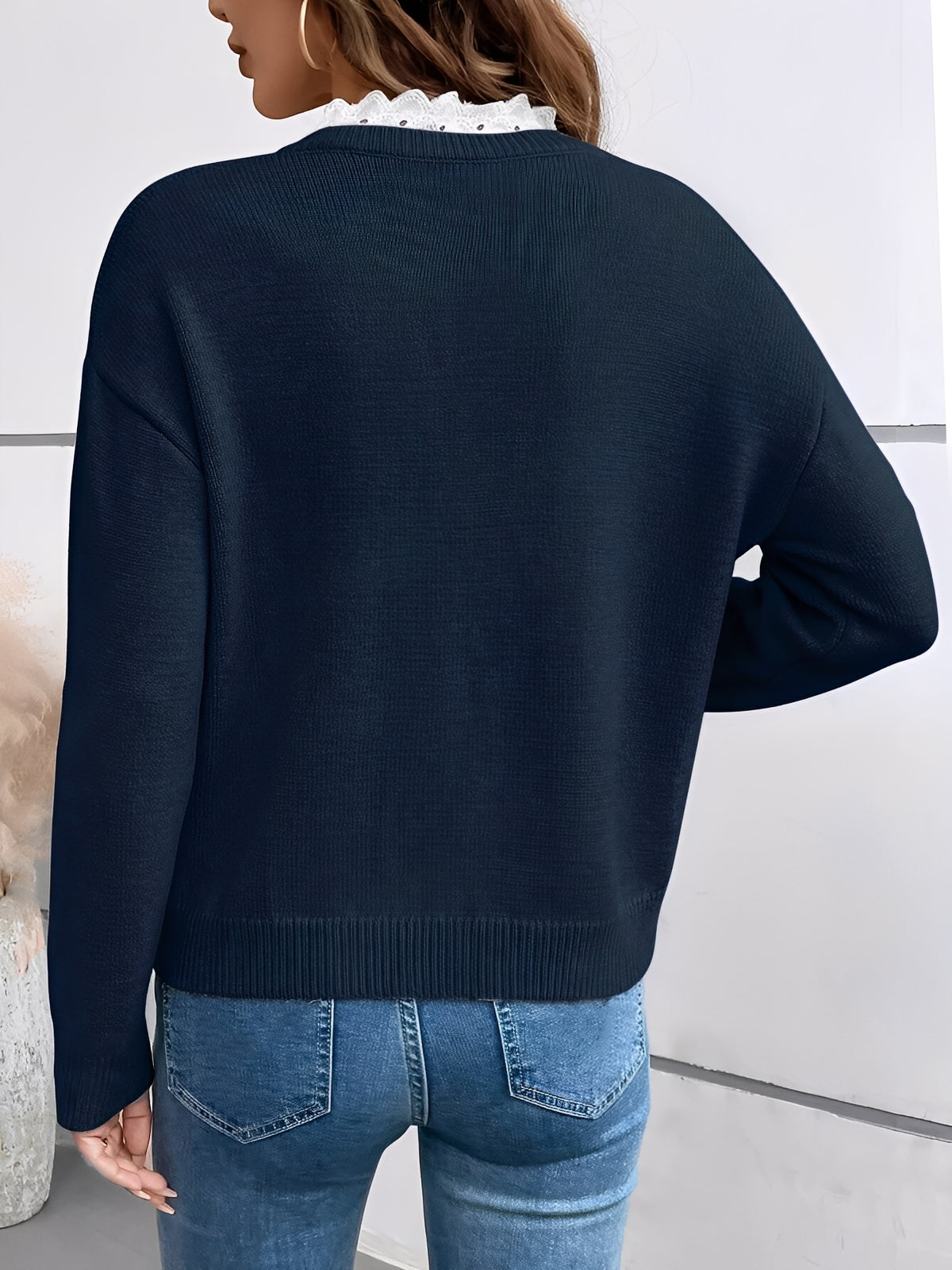 Women's V-neck knit sweater with white lace collar and long sleeves