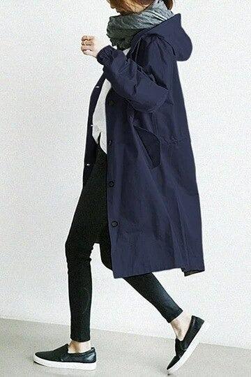 Women's hooded trench coat with button front and angled pockets
