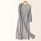 Women's long open front cardigan with three-quarter sleeves and side slits