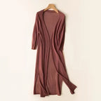 Women's long open front cardigan with three-quarter sleeves and side slits