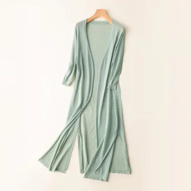 Women's long open front cardigan with three-quarter sleeves and side slits