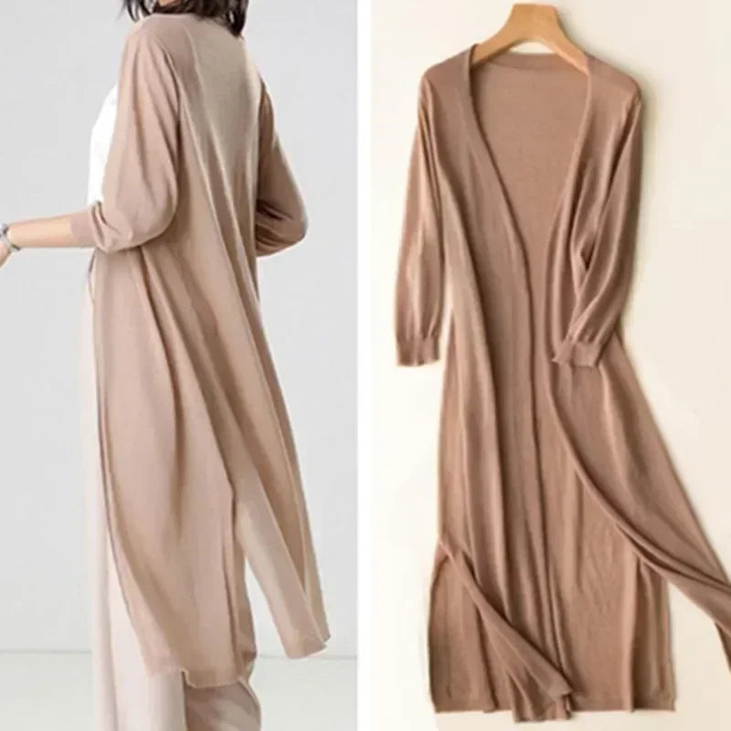 Women's long open front cardigan with three-quarter sleeves and side slits