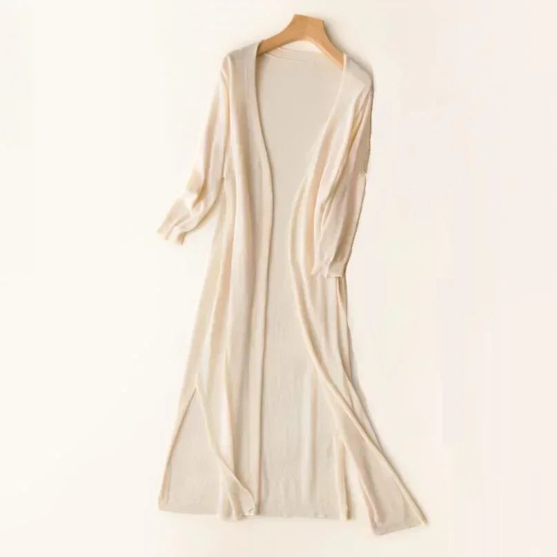Women's long open front cardigan with three-quarter sleeves and side slits