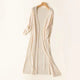 Women's long open front cardigan with three-quarter sleeves and side slits