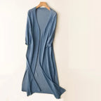 Women's long open front cardigan with three-quarter sleeves and side slits