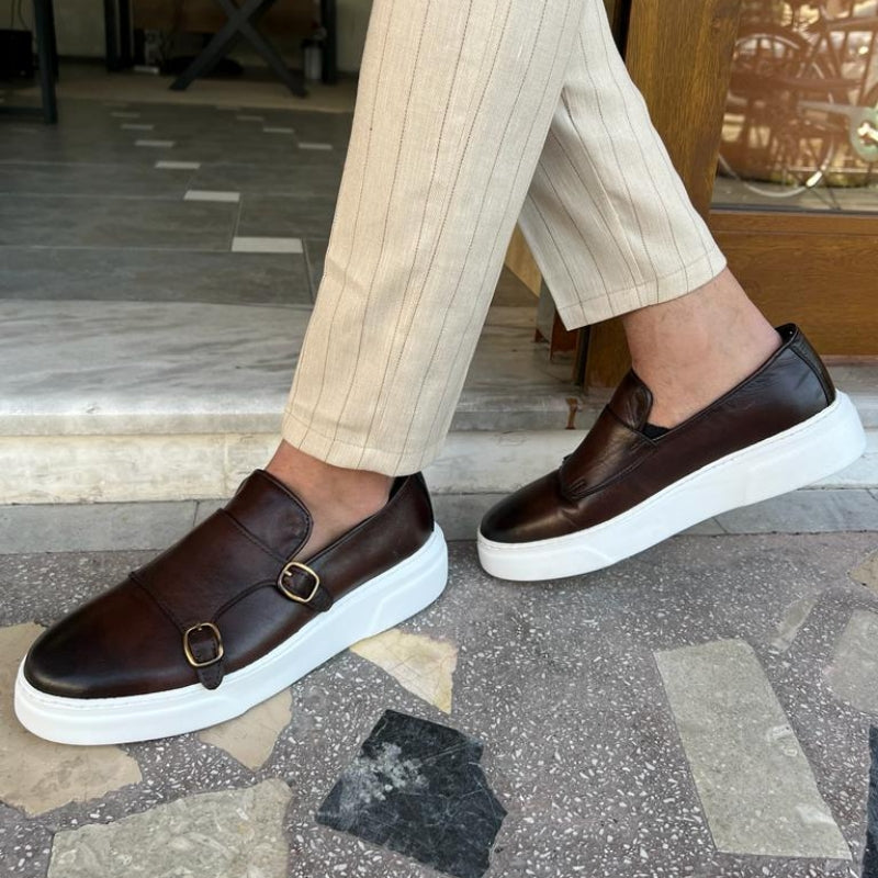 Men's double monk strap slip-on loafers with buckle detailing and flat white soles