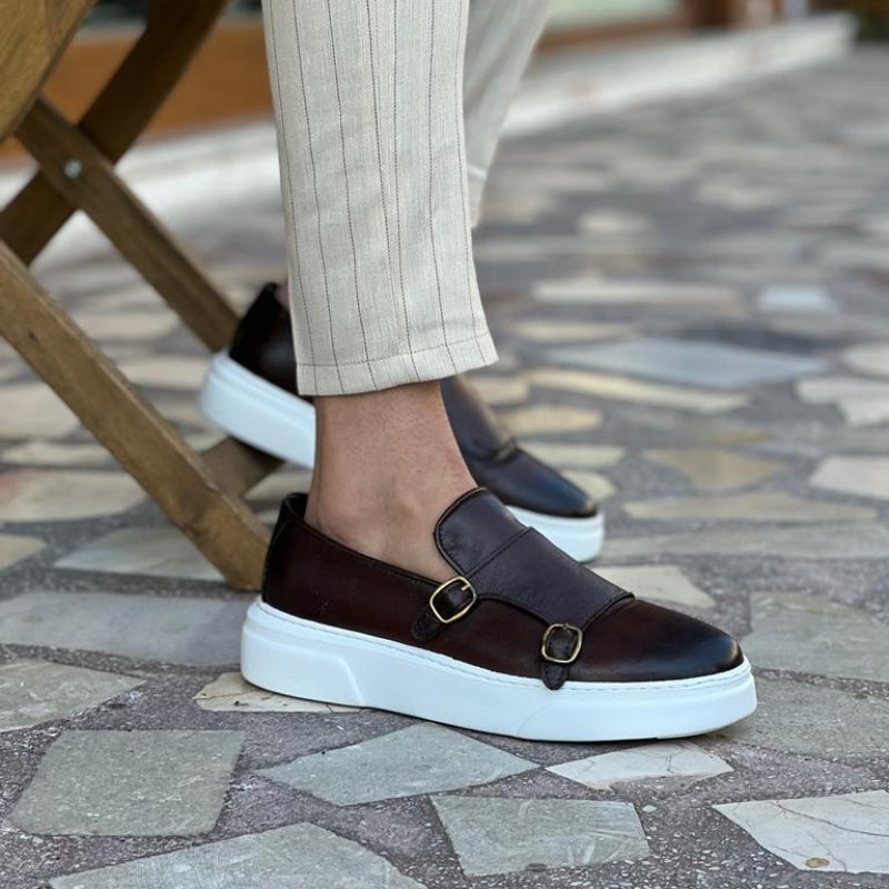 Men's double monk strap slip-on loafers with buckle detailing and flat white soles
