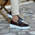 Men's double monk strap slip-on loafers with buckle detailing and flat white soles