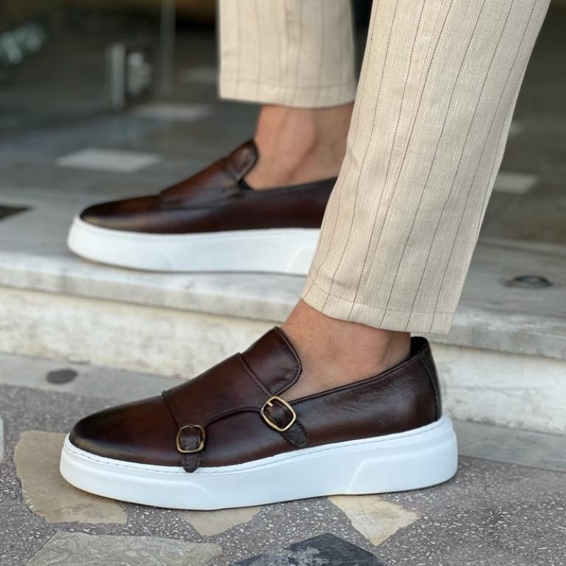 Men's double monk strap slip-on loafers with buckle detailing and flat white soles
