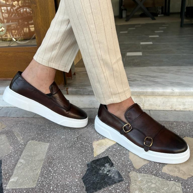 Men's double monk strap slip-on loafers with buckle detailing and flat white soles