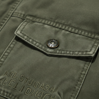 Men's utility denim jacket with high collar and multiple flap pockets