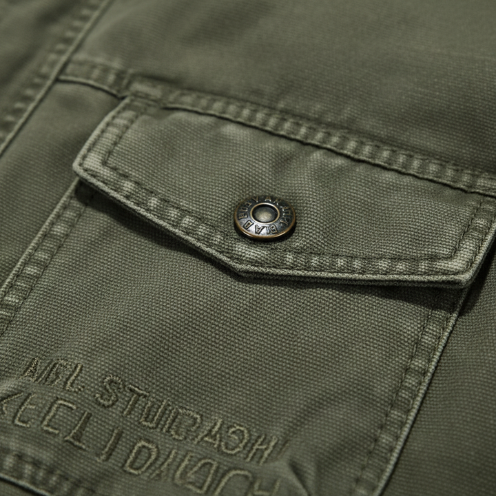 Men's utility denim jacket with high collar and multiple flap pockets