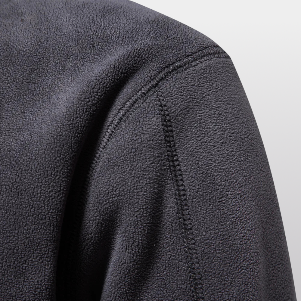 Men's quarter-zip fleece pullover with stand collar and long sleeves