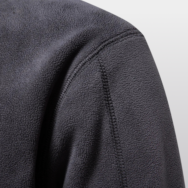 Men's quarter-zip fleece pullover with stand collar and long sleeves