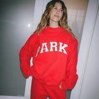 Women's oversized sweatshirt with mock neck, long sleeves and varsity lettering