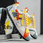 Colourblock utility trainers with layered panels and lace-up fronts