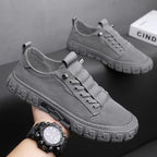 Low top lace-up sneakers with textured flat soles