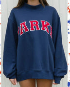 Women's oversized sweatshirt with mock neck, long sleeves and varsity lettering